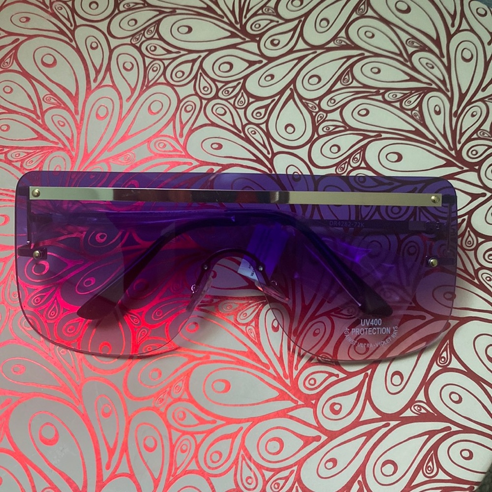 Brand new squared purple sunglasses. Gold lining on upper part of sunglasses.